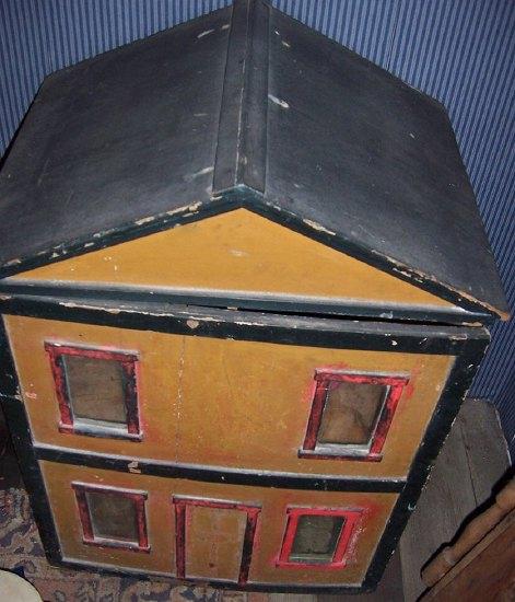 Appraisal: A Victorian painted doll's house the hinged door enclosing four