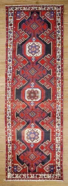 Appraisal: A Persian Runner th c red ground with segmented central