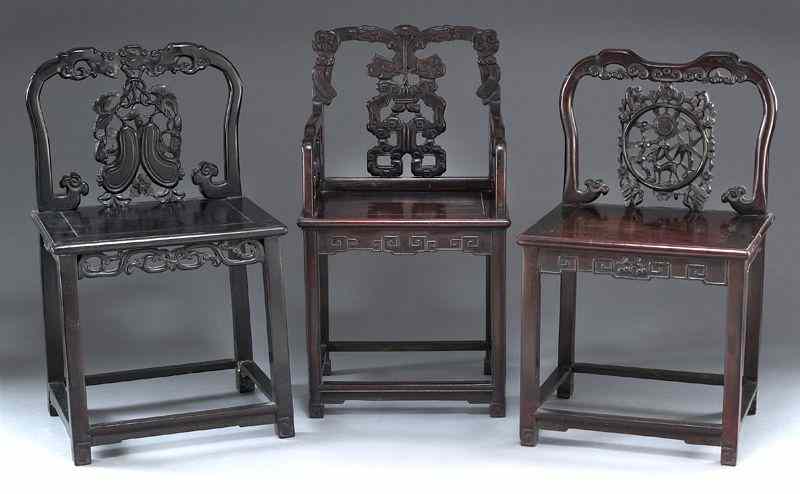 Appraisal: Chinese carved rosewood chairs ''H x ''W x ''D