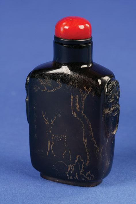 Appraisal: A SMOKEY CRYSTAL BOTTLE of rectangular form the front decorated