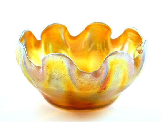 Appraisal: L C Tiffany finger bowl irregular scalloped form in gold