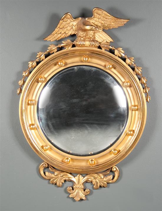 Appraisal: Centennial Regency style giltwood eagle convex mirror late th early