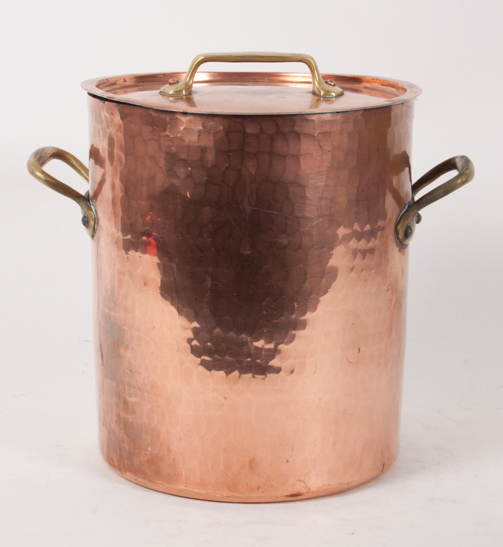 Appraisal: French hammered copper and brass cooking pot lidded pot with