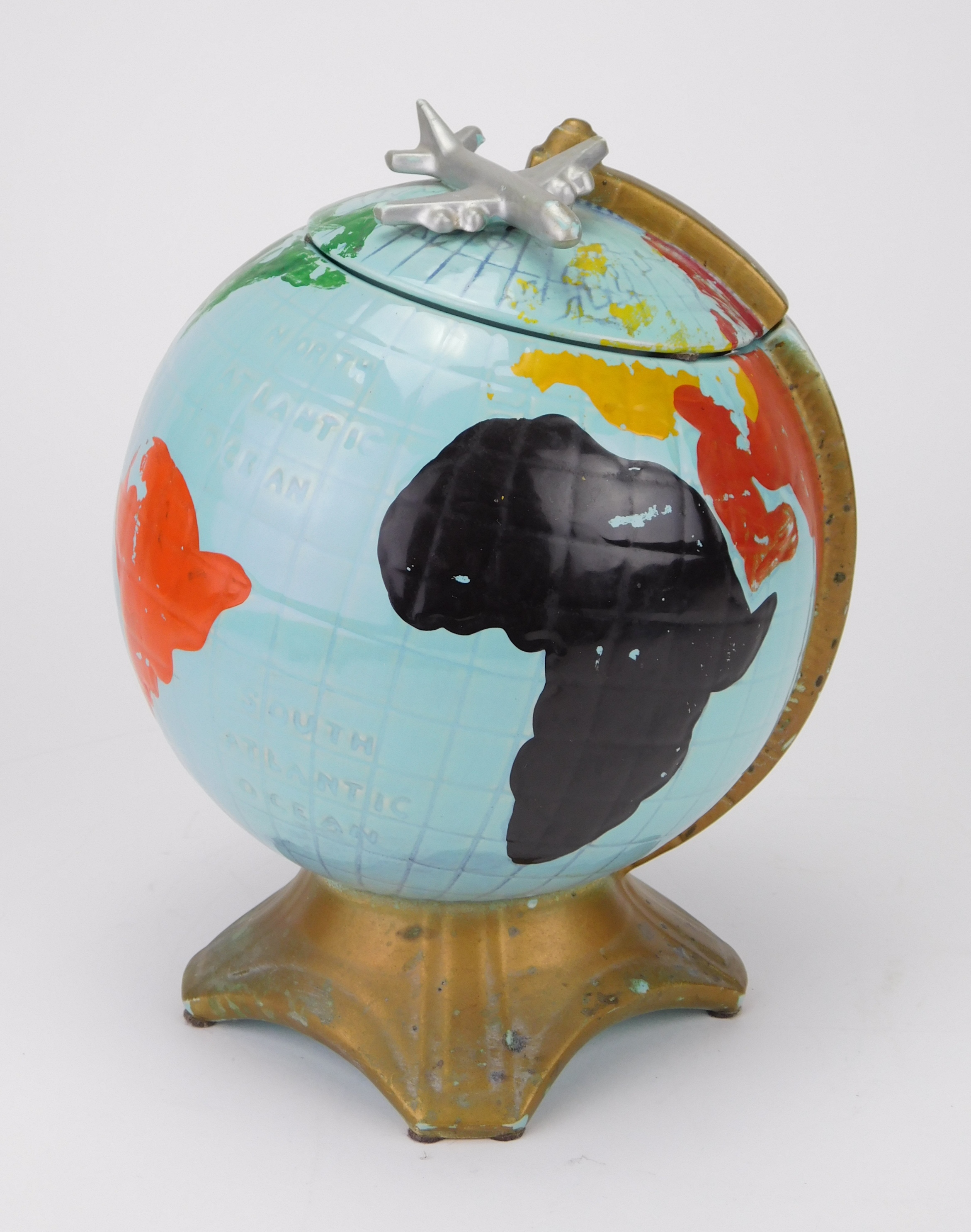 Appraisal: Mc Coy pottery 'World Globe' cookie jar with airplane Mold