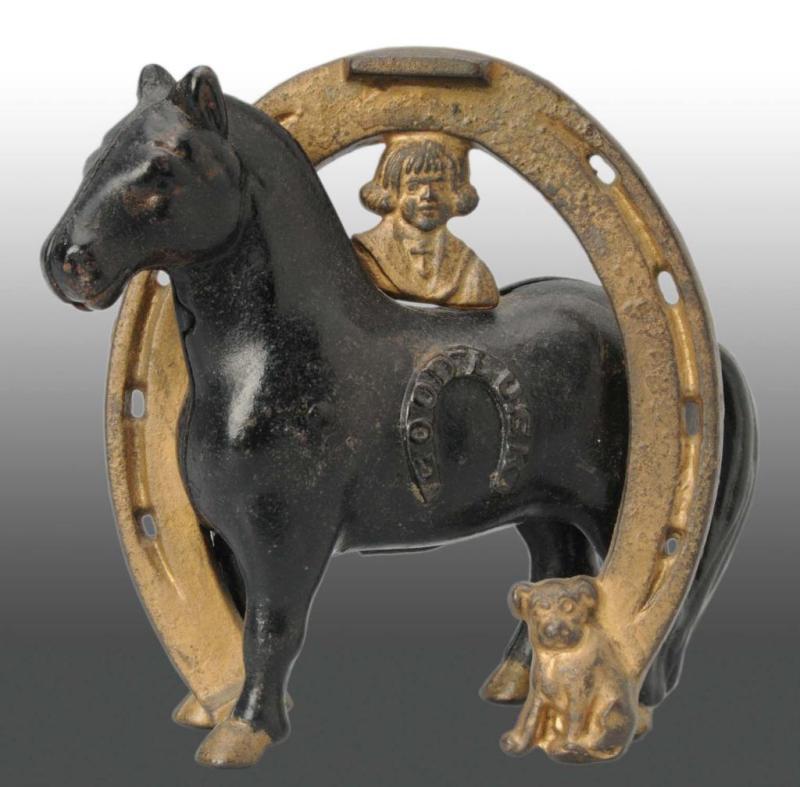 Appraisal: Cast Iron Good Luck Horse Shoe Still Bank Description Manufactured