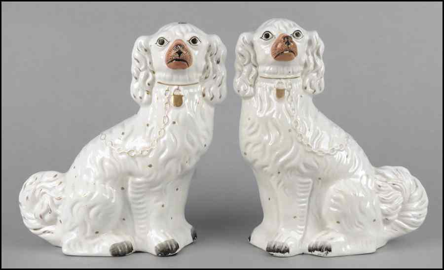 Appraisal: PAIR OF PORCELAIN STAFFORDSHIRE DOGS Height '' Condition No Specific