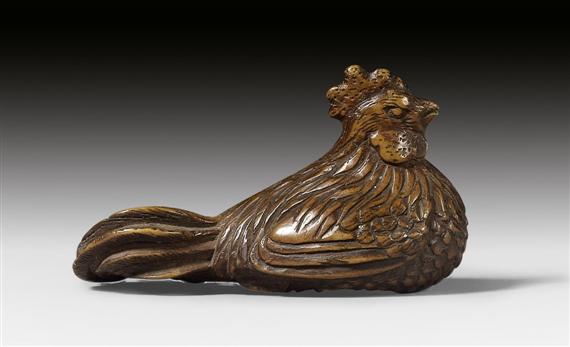 Appraisal: A WOODEN NETSUKE OF A ROOSTER FINELY CARVED AND SIGNED