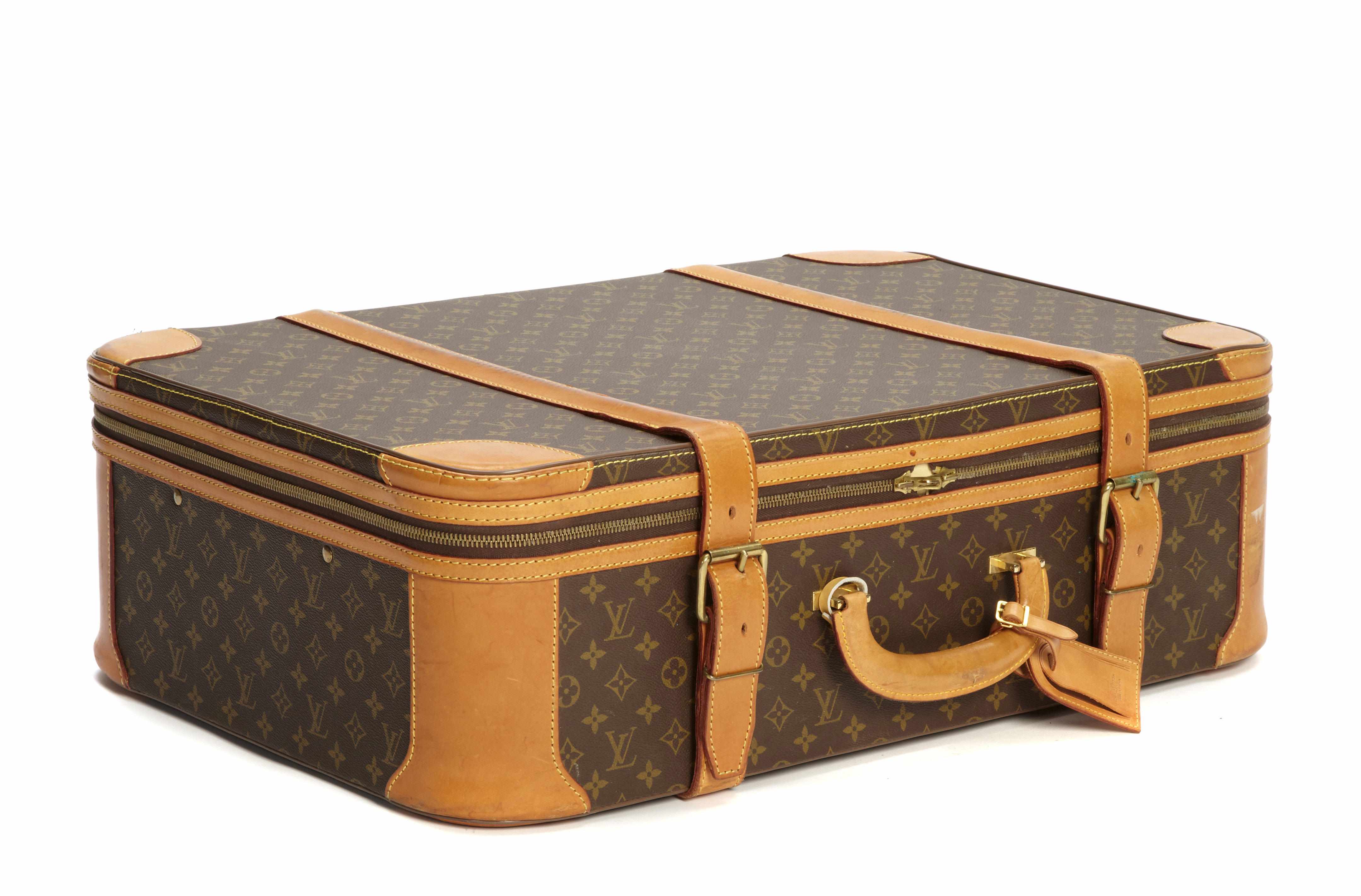 Appraisal: A Louis Vuitton soft sided suitcase size in x in