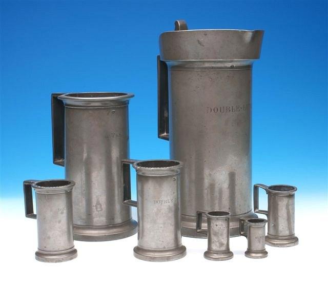 Appraisal: A matched set of seven Continental pewter liquid measures ranging