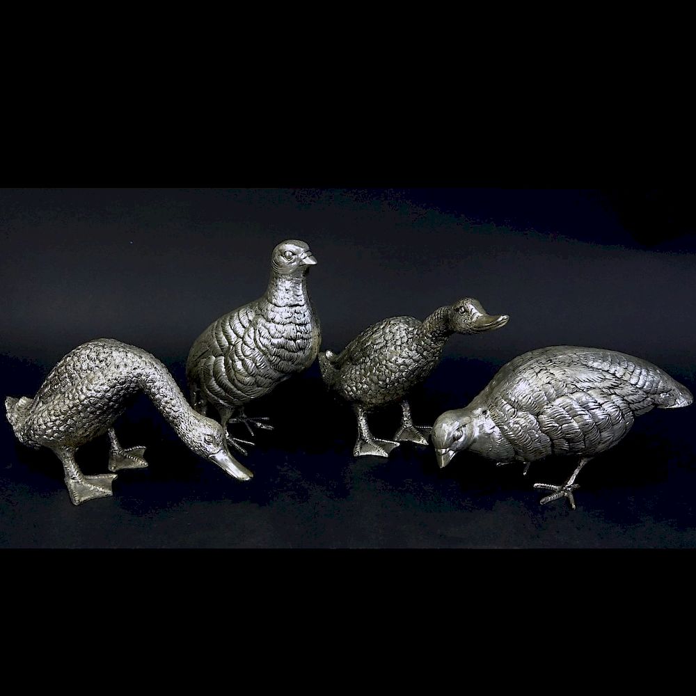 Appraisal: Four Antique Silver Plated Bird Figurines Four Antique Edwardian Style