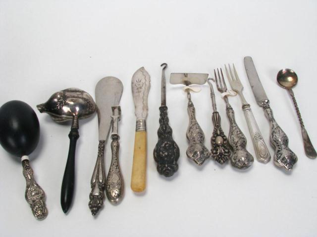 Appraisal: A large lot of sterling silver accessory items including tea