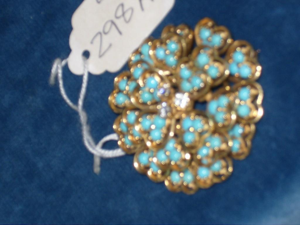 Appraisal: An ct gold brooch with heart shaped turquoise setting and