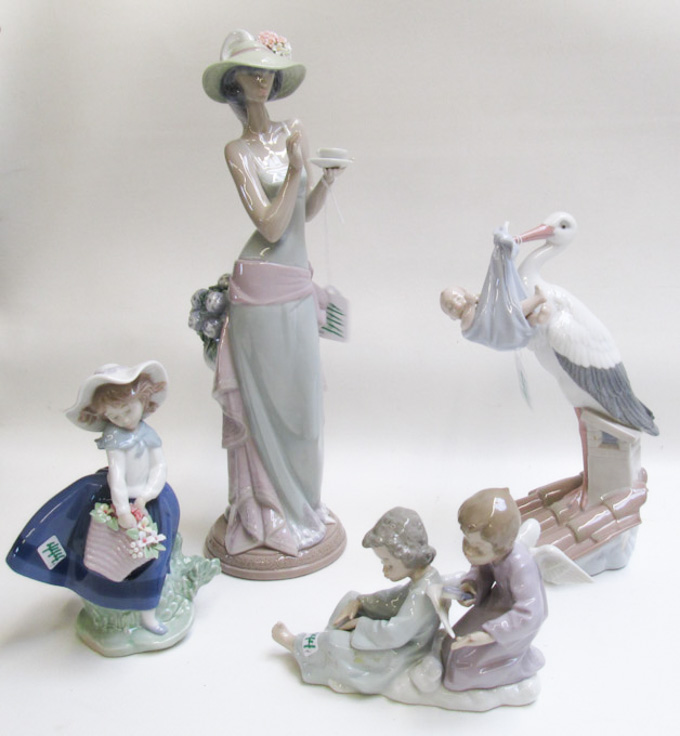 Appraisal: FOUR LLADRO PORCELAIN FIGURINES Tea Time by sculptor Juan Huerta