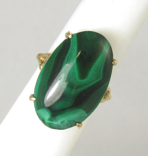 Appraisal: MALACHITE AND FOURTEEN KARAT GOLD RING with four yellow gold