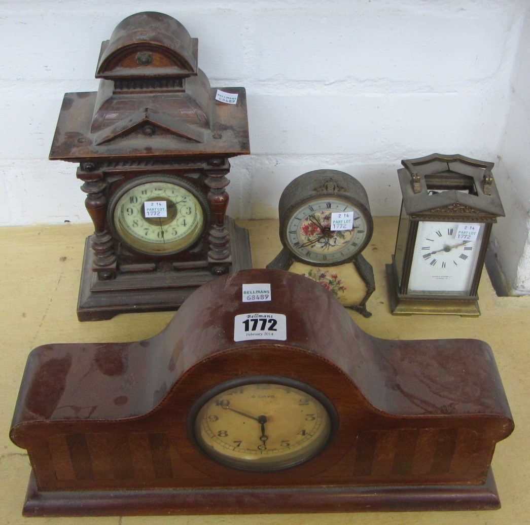 Appraisal: An Edwardian mahogany cased eight day mantel clock a continental