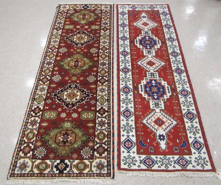 Appraisal: TWO HAND KNOTTED ORIENTAL HALL RUGS Indo-Persian ' x '