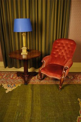 Appraisal: A Victorian rosewood occasional table circular top with mahogany tapering