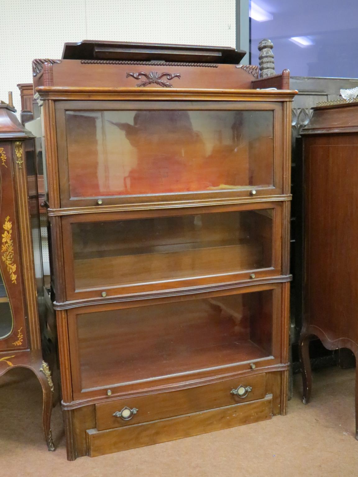 Appraisal: An early Globe Wernicke mahogany sectional bookcase three glazed sections