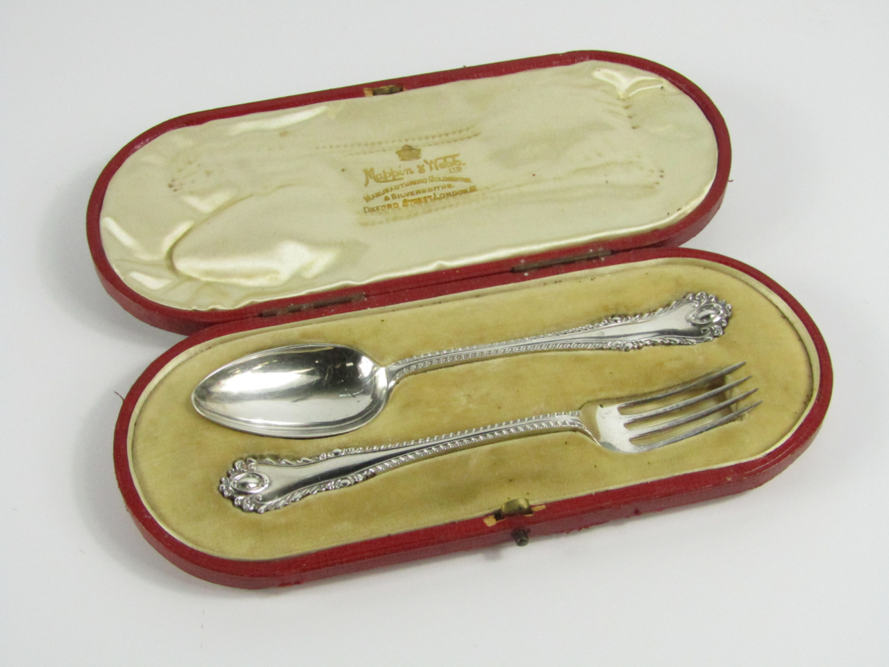 Appraisal: An Edwardian silver christening set comprising a spoon and fork