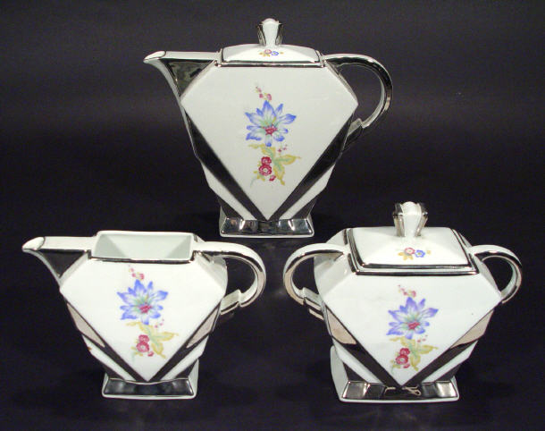 Appraisal: Art Deco style Czechoslovakian three piece teaset with silver lustre