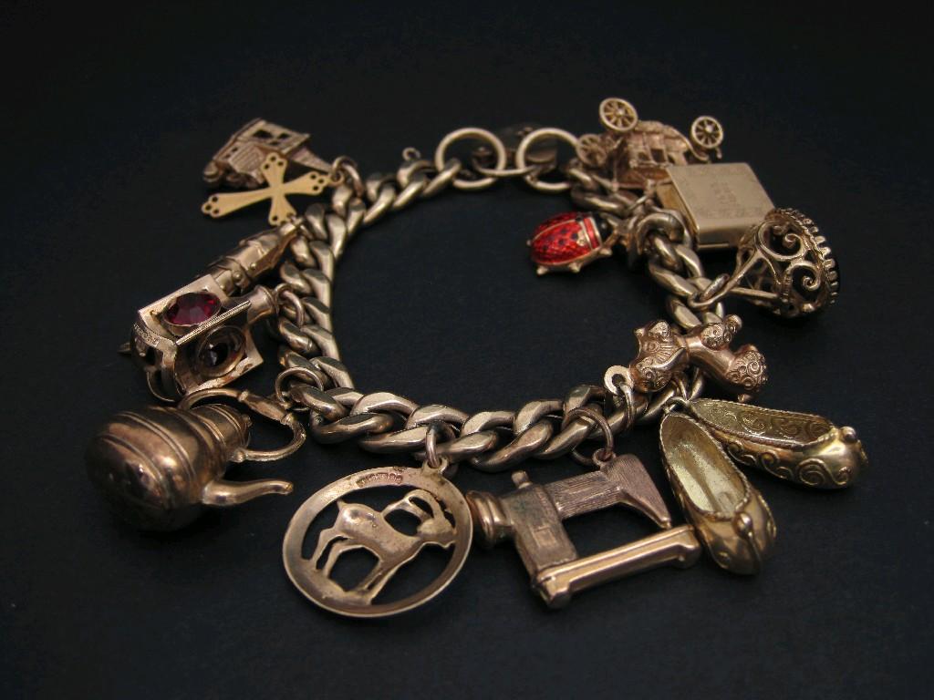 Appraisal: A ct gold flattened curb-link Bracelet with padlock fastener and