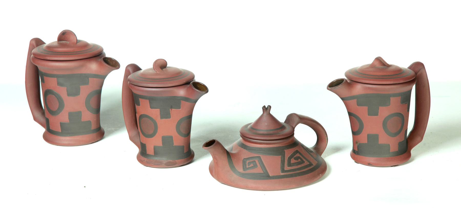 Appraisal: FOUR CLIFTON POTTERY INDIAN WARE PIECES American st quarter- th