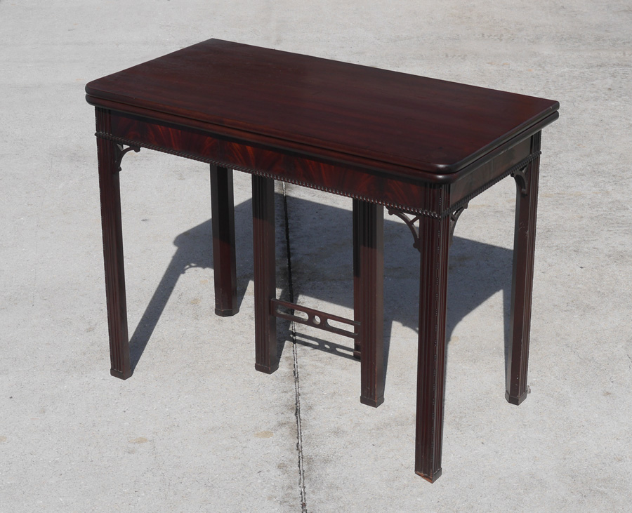 Appraisal: MAHOGANY FLIP TOP FOYER DINING TABLE Chippendale style foyer table