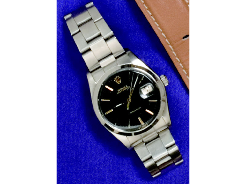 Appraisal: ROLEX WATCH Man's stainless steel oysterdate with black dial with