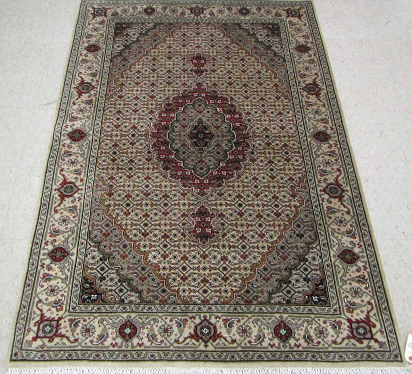 Appraisal: HAND KNOTTED ORIENTAL AREA RUG Indo-Bijar central medallion and overall