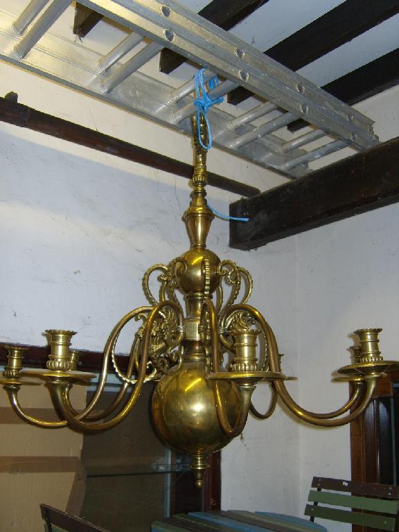 Appraisal: A very large Dutch brass -branch chandelier with bulbous stem