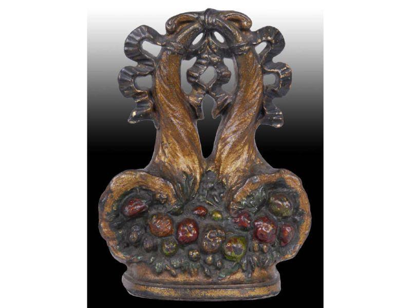 Appraisal: Cornucopias Cast Iron Doorstop Description - '' x '' Made