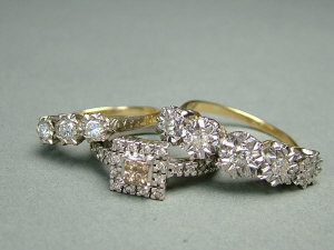 Appraisal: Three gold and diamond set rings to include a ct