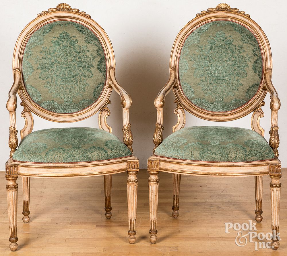 Appraisal: Pair of French painted armchairs Pair of French painted armchairs