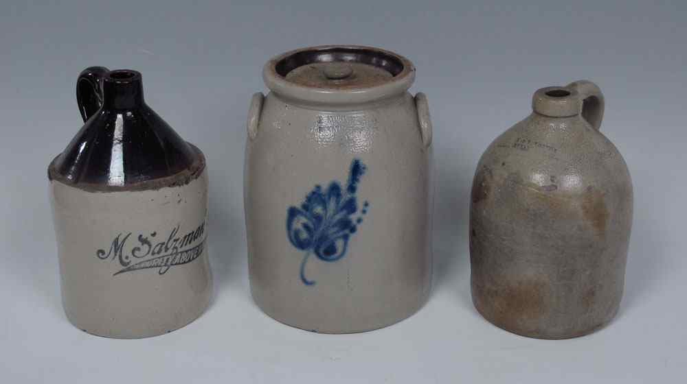 Appraisal: STONEWARE JUGS AND A CROCK To include E Norton Co