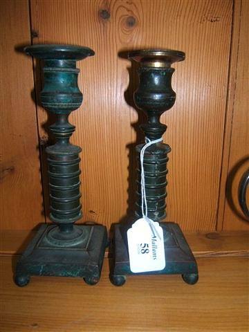 Appraisal: A pair of th century brass candlesticks of ring-turned form