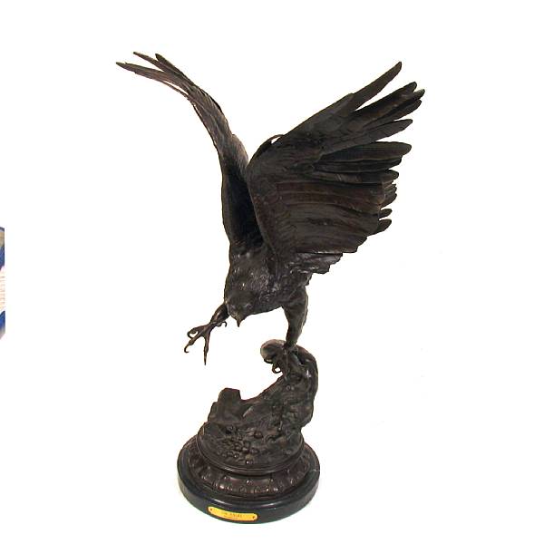 Appraisal: A patinated bronze model of an eagle cast after a