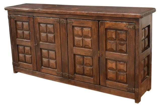 Appraisal: Spanish Baroque style oak sideboard having a rectangular top over