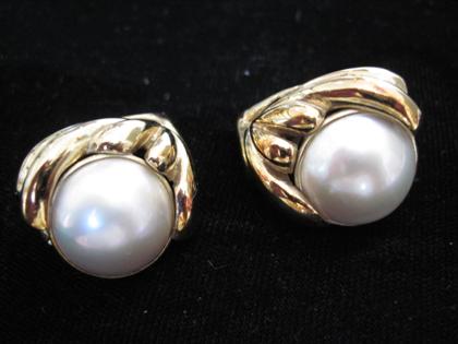 Appraisal: karat yellow gold freeform mabe pearls earringsPost and omega clip