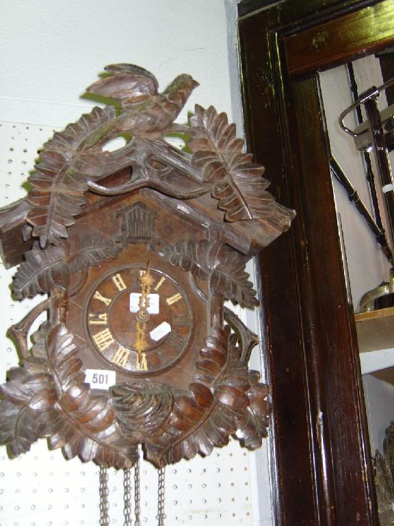 Appraisal: A late th century cuckoo clock of usual chalet form