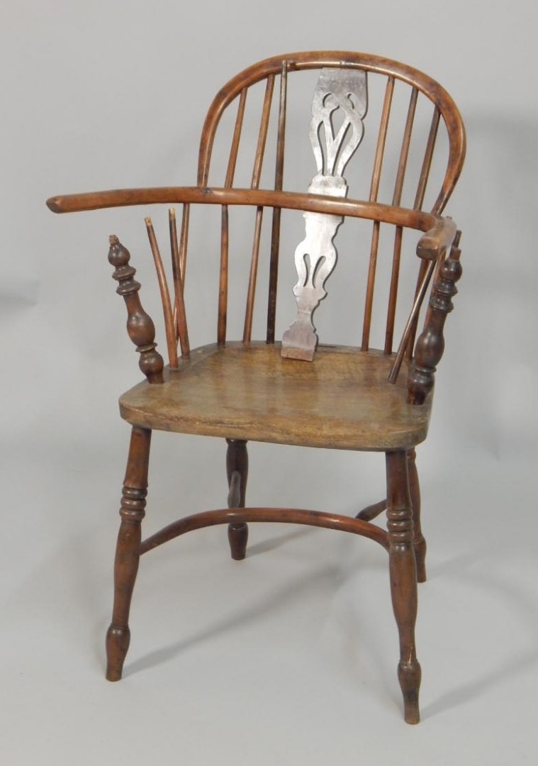 Appraisal: A mid thC yew ash and elm Windsor chair with