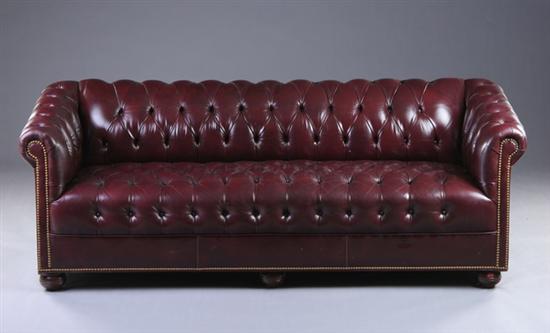 Appraisal: CONTEMPORARY CHESTERFIELD STYLE SOFA th century hand-antiqued ox-blood leather Tufted