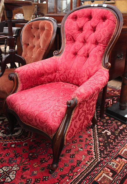 Appraisal: A VICTORIAN MAHOGANY FRAMED GENTLEMAN'S ARMCHAIR on cabriole legs upholstered