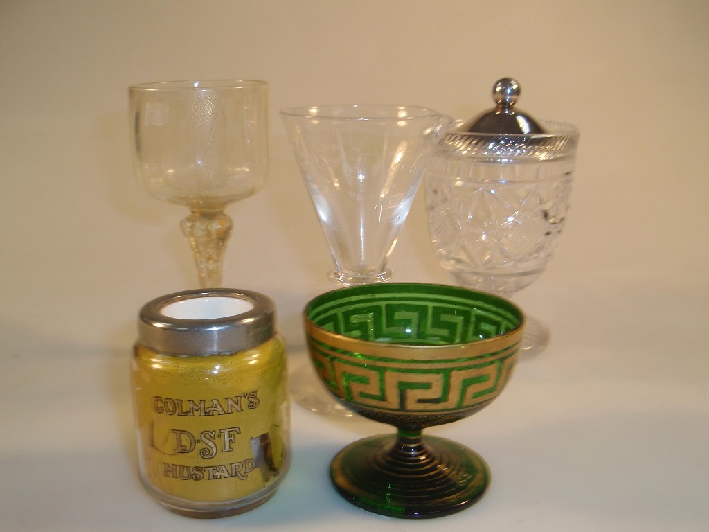 Appraisal: A Murano type wine glass with a moulded circular bowl