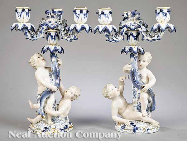 Appraisal: Two Pairs of Meissen Blue and White Porcelain Three-Light Candelabra