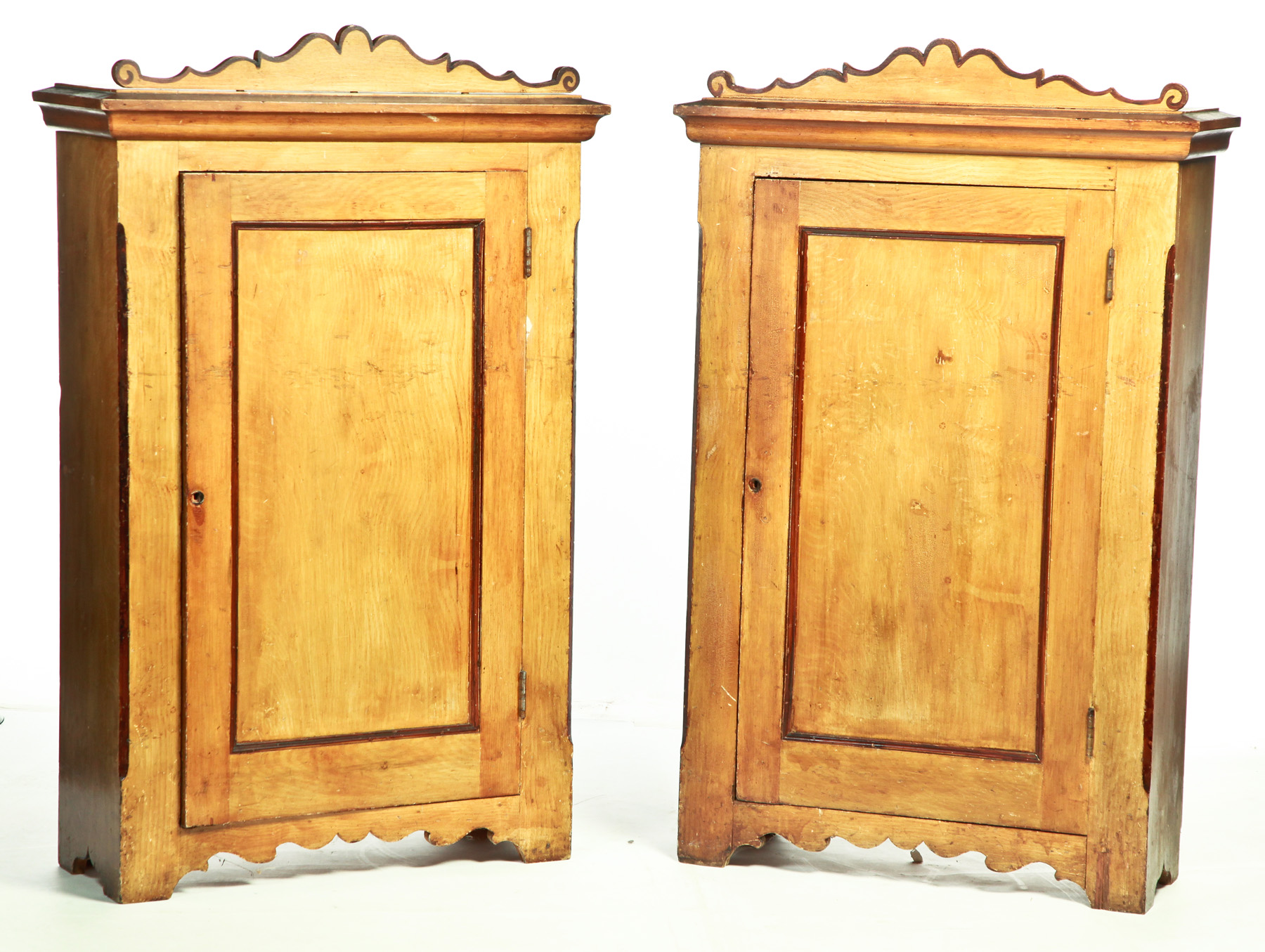 Appraisal: PAIR OF AMERICAN DECORATED CUPBOARDS Nineteenth century mixed woods Small