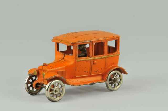 Appraisal: ARCADE MODEL ''T'' FOUR DOOR SEDAN Cast iron painted in