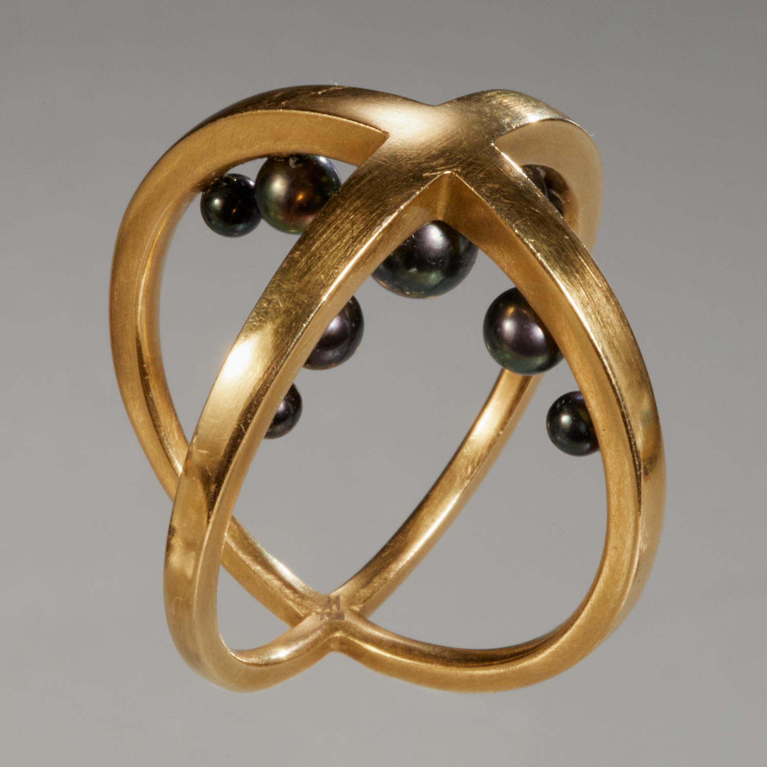 Appraisal: MODERNIST DESIGNER K INTERSECTING CIRCLE RING Late th c the