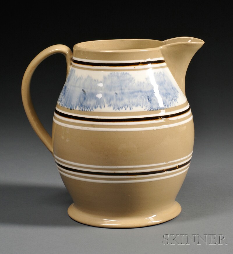 Appraisal: Mochaware Pitcher England th century the pitcher decorated with thin