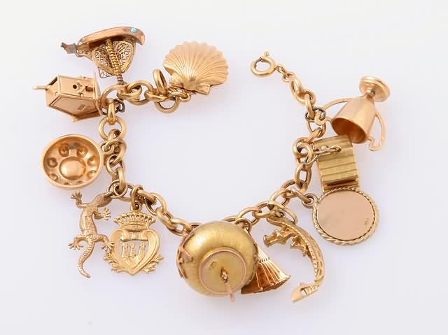 Appraisal: KY link bracelet with various K K K and accented