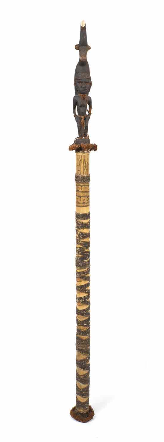 Appraisal: An African Carved Wood Figural Staff depicting a standing nude